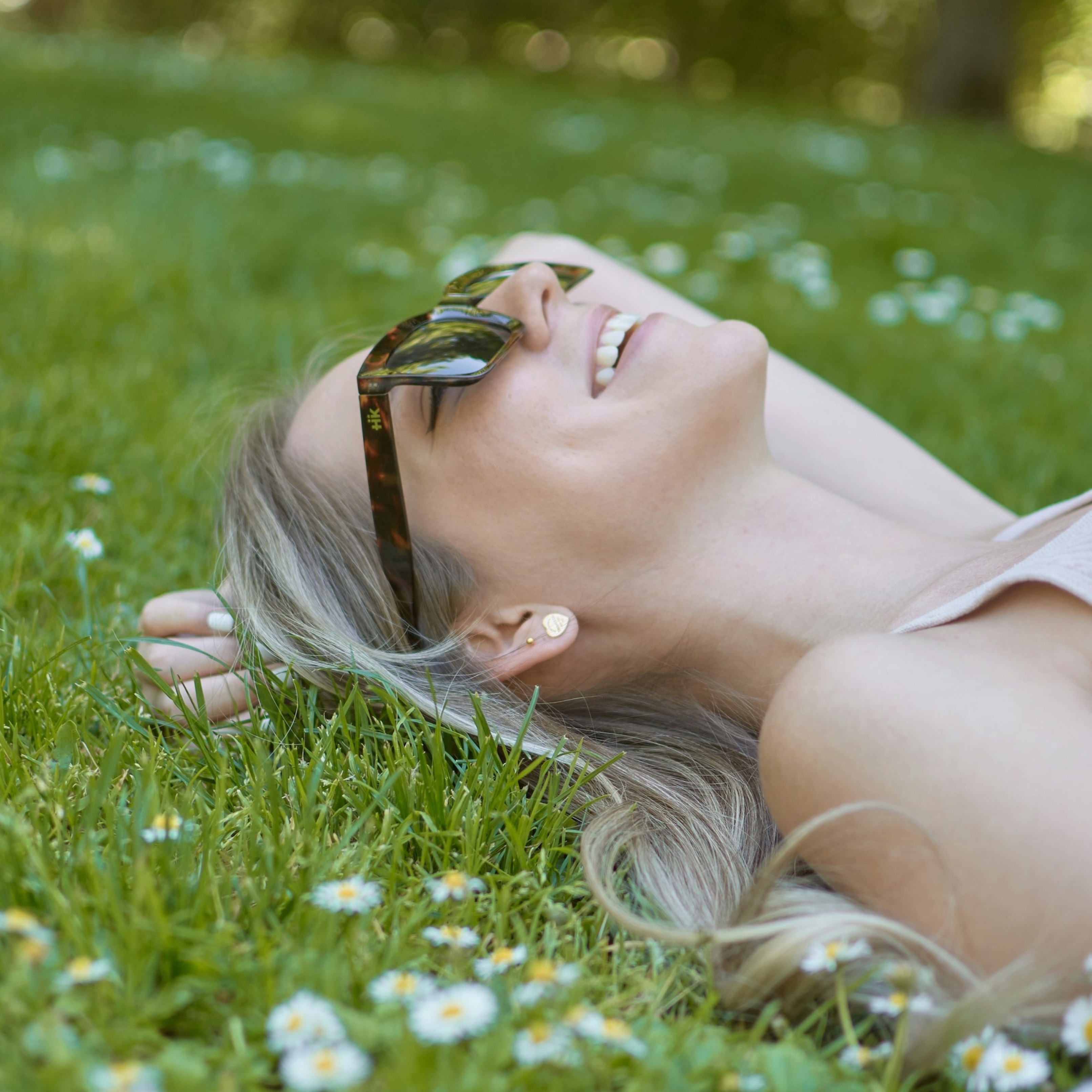 Relaxed person outdoors, symbolizing stress relief and emotional well-being